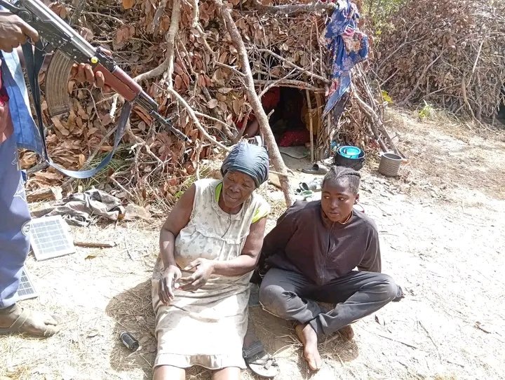 Terrorists Release Chilling Photo Of Slain Kaduna Priest’s Wife, Daughter — Gun Pointed At Their Heads cover4 1765359718